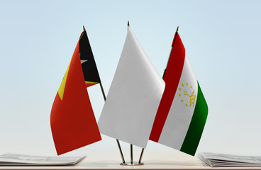  Flags of East Timor and Tajikistan with a white flag in the middle