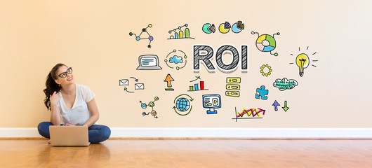 ROI text with young woman using a laptop computer on floor