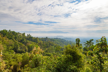Fototapeta premium View to Gunung Merapi, Merbabu, Borobudur from Punthuk Setumbu viewpoint near Yogyakarta city, Central Java, Indonesia