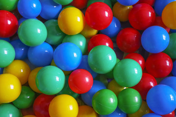 Colorful balls in the kids room as background