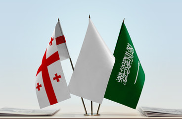  Flags of Georgia and Saudi Arabia with a white flag in the middle