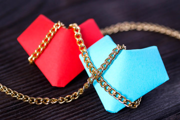 Abstract hearts connected with a chain