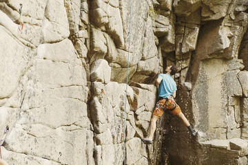Climber to climb a big wall.Climber to climb a big wall.