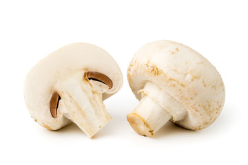 Fototapeta na wymiar The whole mushroom and half on a white.