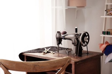 Tailor desk with old sewing machine