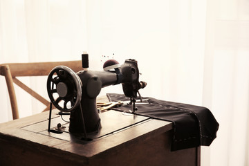 Tailor desk with old sewing machine