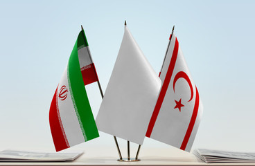 Flags of Iran and Northern Cyprus with a white flag in the middle