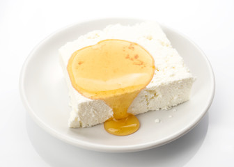 piece of cottage cheese with honey