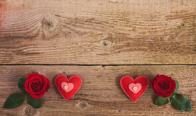 Valentines day background with red rose and heart over wood board