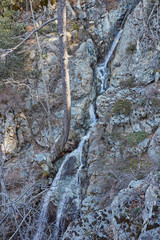 Mountain river landscape. Silky smooth stream of clear water