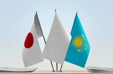 Flags of Japan and Kazakhstan with a white flag in the middle