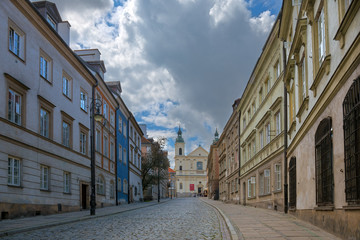 Fototapeta na wymiar Street of the old town in Warsaw. Street Mostowa