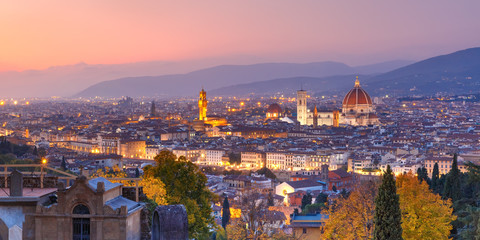 Fototapeta premium Beautiful panoramic view of Duomo Santa Maria Del Fiore and tower of Palazzo Vecchio during evening blue hour in Florence, Tuscany, Italy