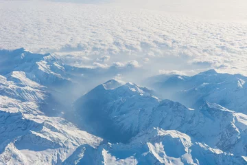 Keuken spatwand met foto Aerial view of the Swiss alps. Flying over Alps. mazing view on mountain. © Toniflap
