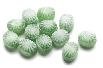 Hard candies over white background