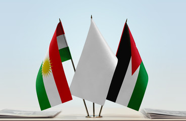 Flags of Kurdistan and Jordan with a white flag in the middle