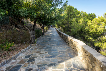 Stone pathway leading up the hill overlooking Malaga, Spain, Europe