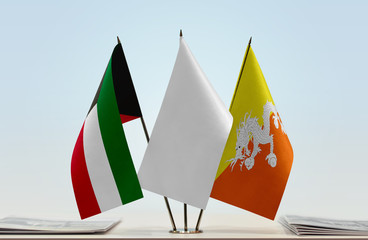 Flags of Kuwait and Bhutan with a white flag in the middle