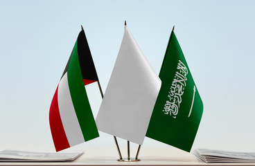 Flags of Kuwait and Saudi Arabia with a white flag in the middle