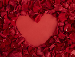 Valentines heart made with red rose petals
