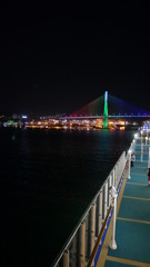 Fototapeta na wymiar night shot of Korea busan bridge from cruise