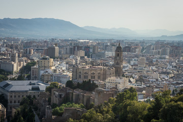 Fototapeta na wymiar Cityscape aerial view of Malaga, Spain. The Cathedral of Malaga is a Renaissance church in the city of Malaga in Andalusia in southern Spain during dusk hour