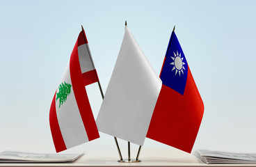 Flags of Lebanon and Taiwan with a white flag in the middle