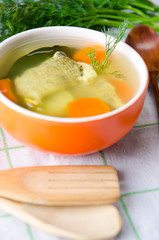 Fish soup served on the table in plate