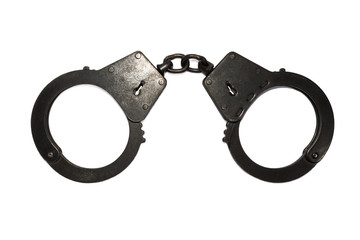 black metal handcuffs with small scratches on white background