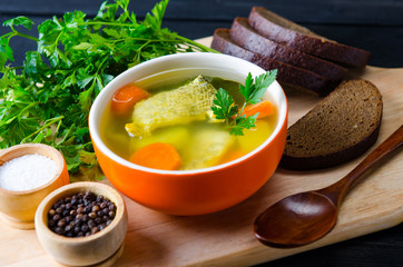 Fish soup served on the table in plate