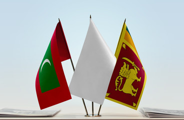 Flags of Maldives and Sri Lanka with a white flag in the middle