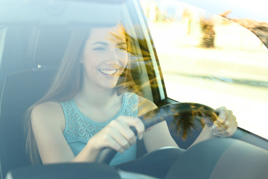 Happy Driver Driving A Car