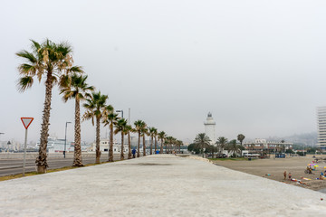The lighthouse at Malagueta beach in Malaga, Spain, Europe