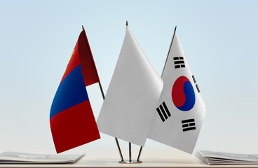 Flags of Mongolia and South Korea with a white flag in the middle