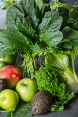 Fresh green vegetables and fruits, ingredients for dietary healthy detox smoothie or salad