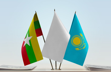 Flags of Myanmar and Kazakhstan with a white flag in the middle