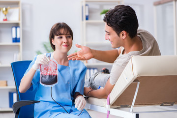 Patient getting blood transfusion in hospital clinic