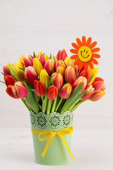A colorful spring greetings card with tulips for Easter, Mother's Day.