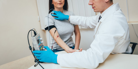 Patient nerves testing using electromyography. EMG