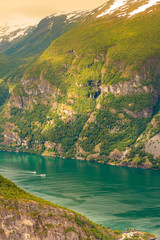 Cruise ship on norwegian fjord