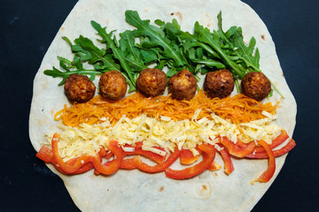 falafel plate on top to garnish, carrot, cabbage, onion, cucumbers, tomatoes, still life, dish