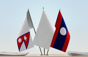  Flags of Nepal and Laos with a white flag in the middle