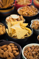 Salty snacks served in bowls
