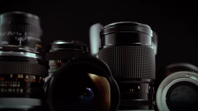 Macro Camera Lens Rotating Display on Black Background
