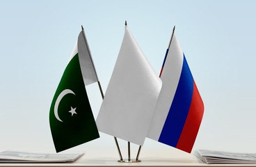 Flags of Pakistan and Russia with a white flag in the middle