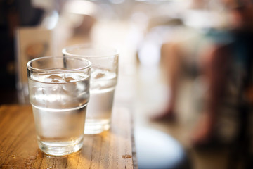 Water in a glass, selective focus