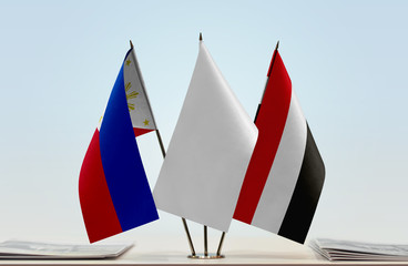 Flags of Philippines and Yemen with a white flag in the middle