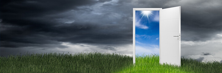 Open door on green wide panorama green grass meadow in front of blue sky / Türe offen wiese grün panorama