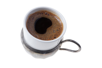 Cup of traditional homemade Turkish coffee on white background
