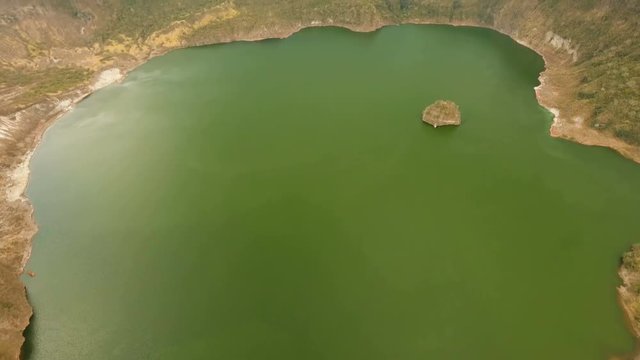 Aerial view Lake crater at Taal Volcano on Luzon Island North of Manila in Philippines. Volcano with a crater on an island in the middle of a lake. Luzon, Philippines. 4K video. Travel concept. Aerial
